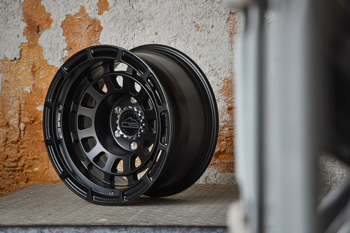 Overland Sector Badlander Forged 17x9 +0 6x135/6x139.7mm 106.1mm All Satin Black by Overland Sector | KOVA Offroad