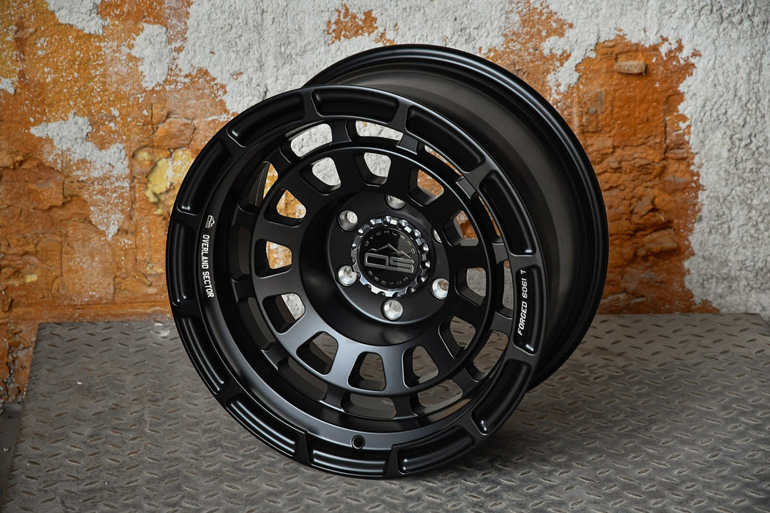 Overland Sector Badlander Forged 17x9 +0 6x135/6x139.7mm 106.1mm All Satin Black by Overland Sector | KOVA Offroad