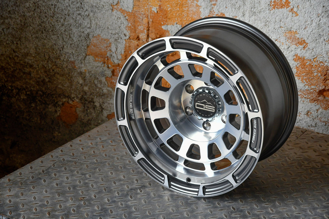 Overland Sector Badlander Forged 17x9 +0 5x139.7mm 108mm Gloss Gun Metal Machined Face by Overland Sector | KOVA Offroad