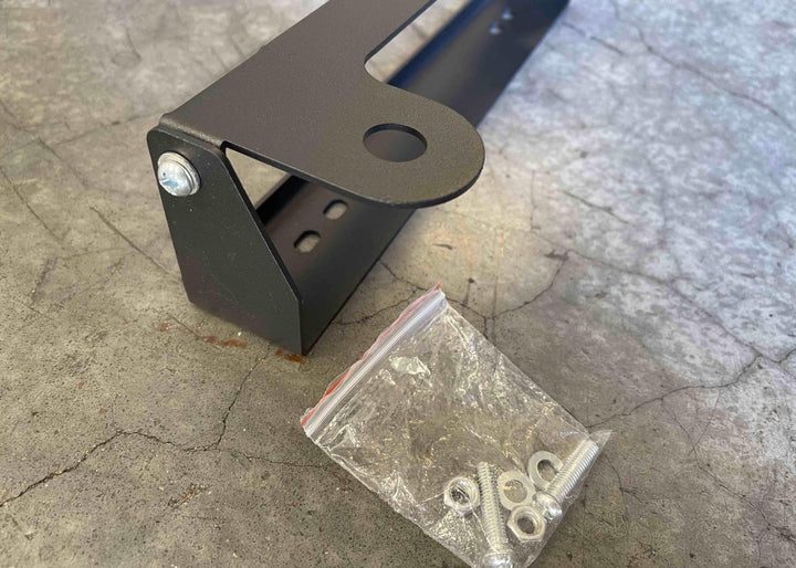 Flip Up Front License Plate Holder - Hawse Fairlead by Backwoods Adventure Mods | KOVA Offroad